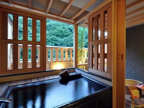 The private onsen on the balcony at Hotel Okada