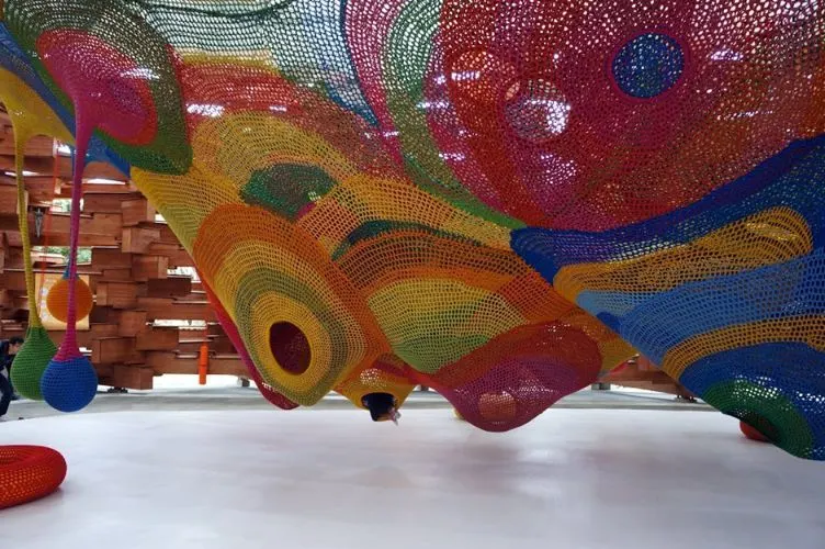 Inside the Woods of Net, a colourful knitted net playground